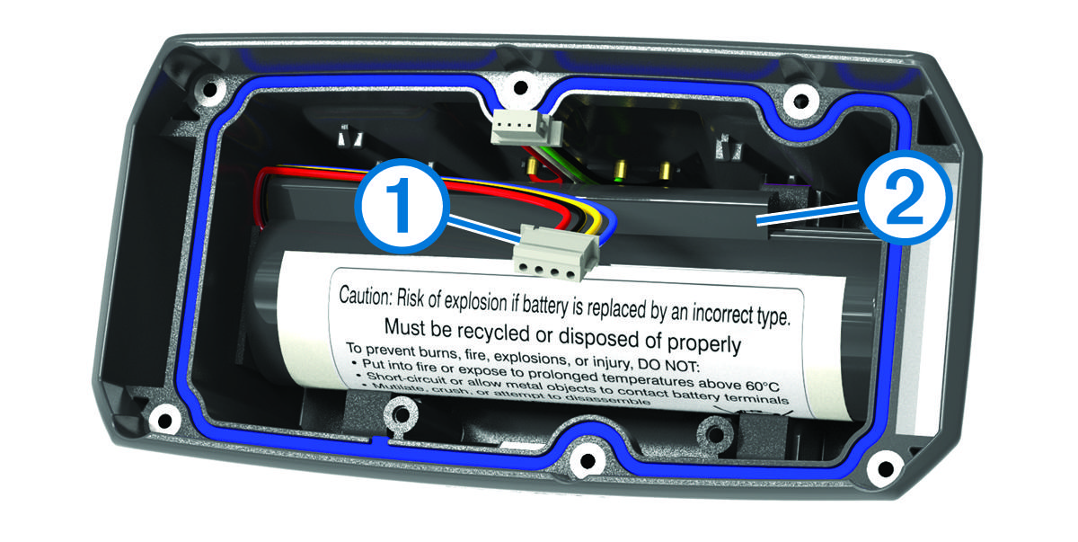 Close-up view of the battery orientation for the dog collar device with callouts