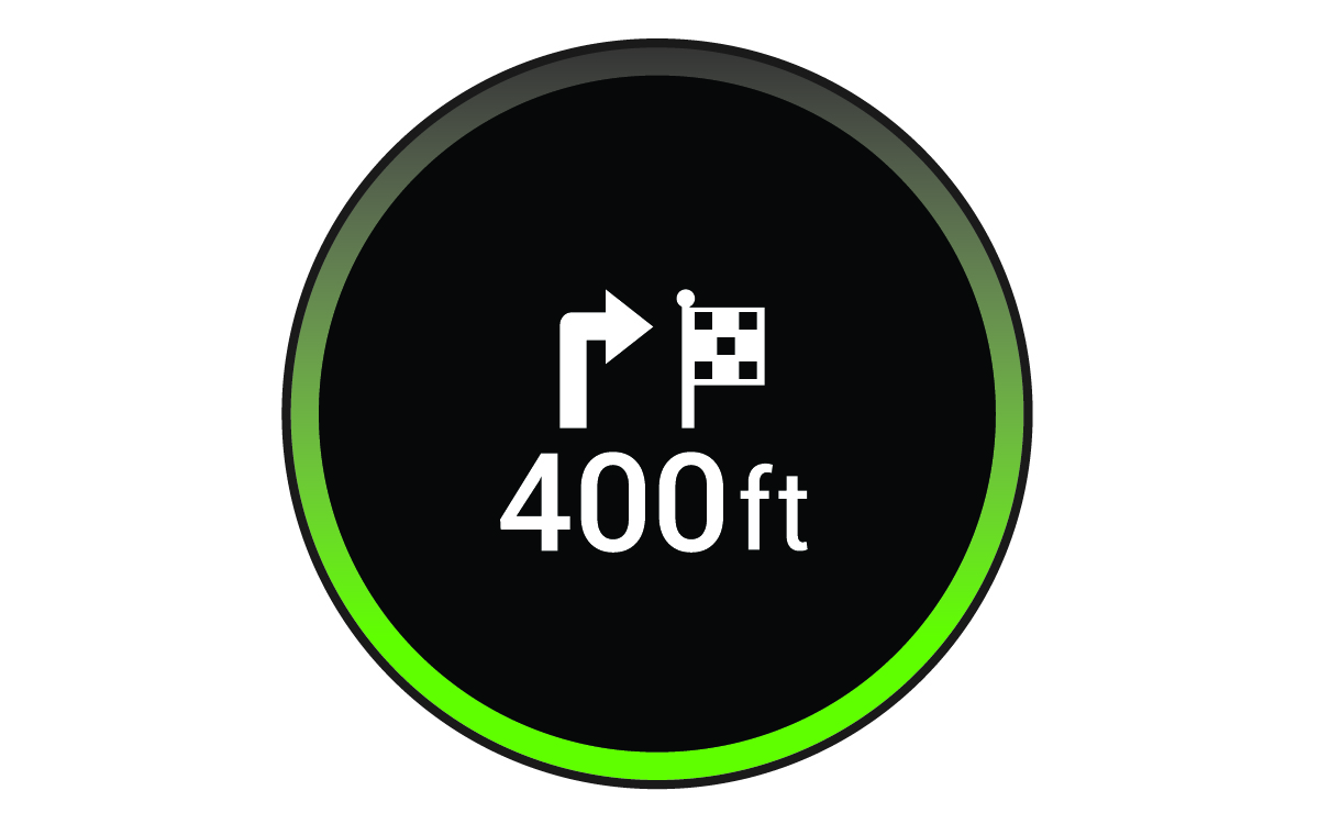 Device screen with destination arrival symbol, distance to the destination, and green LED ring